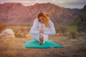 Lady doing yoga in mountain